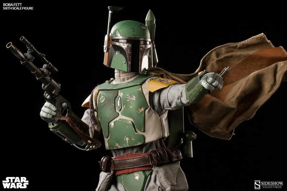 Boba Fett sixth-scale figure posing with a blaster rifle and raised arm, wearing weathered green armor, yellow shoulder plates, and a flowing brown cape